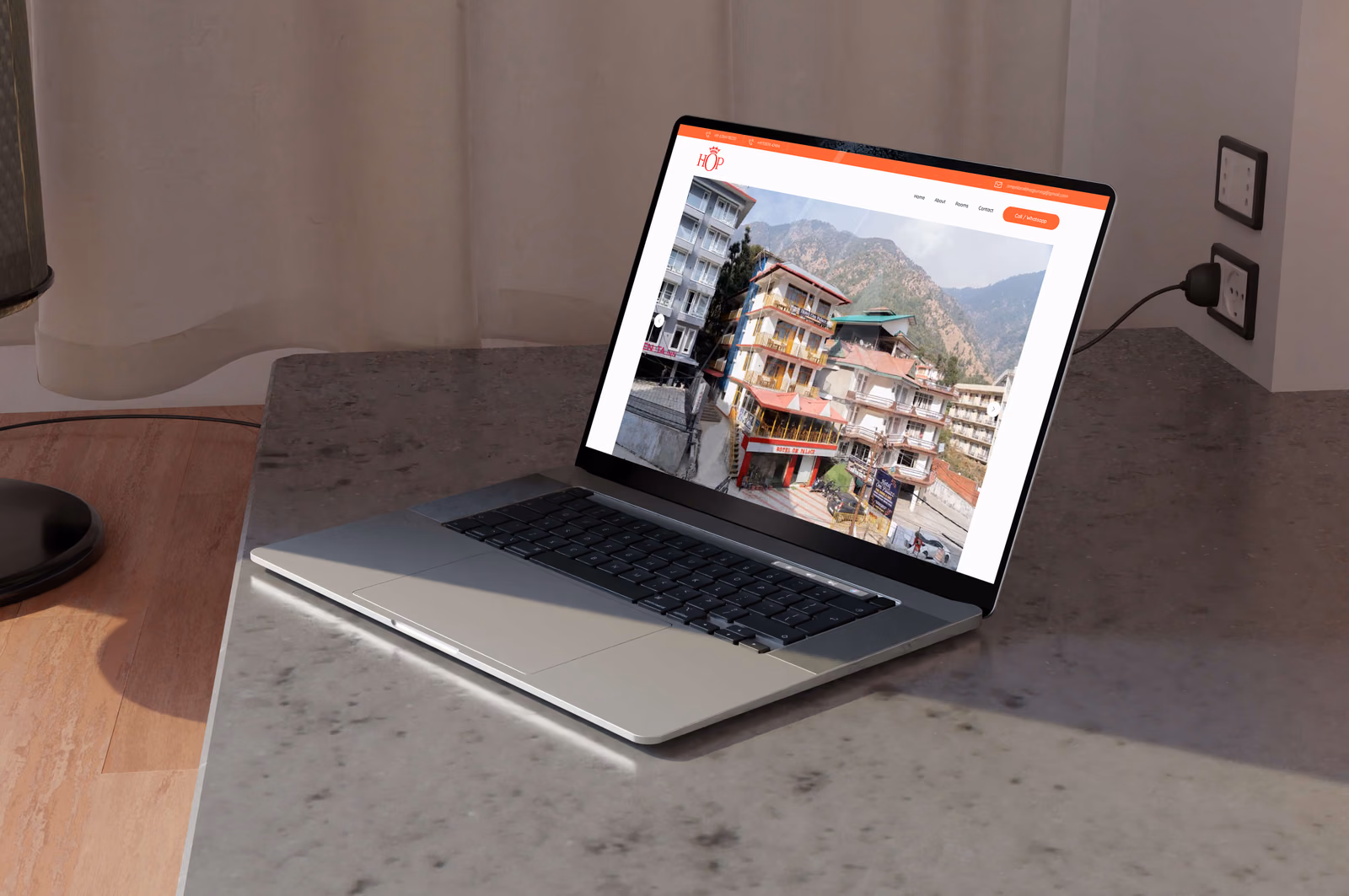 Om Palace website on a laptop