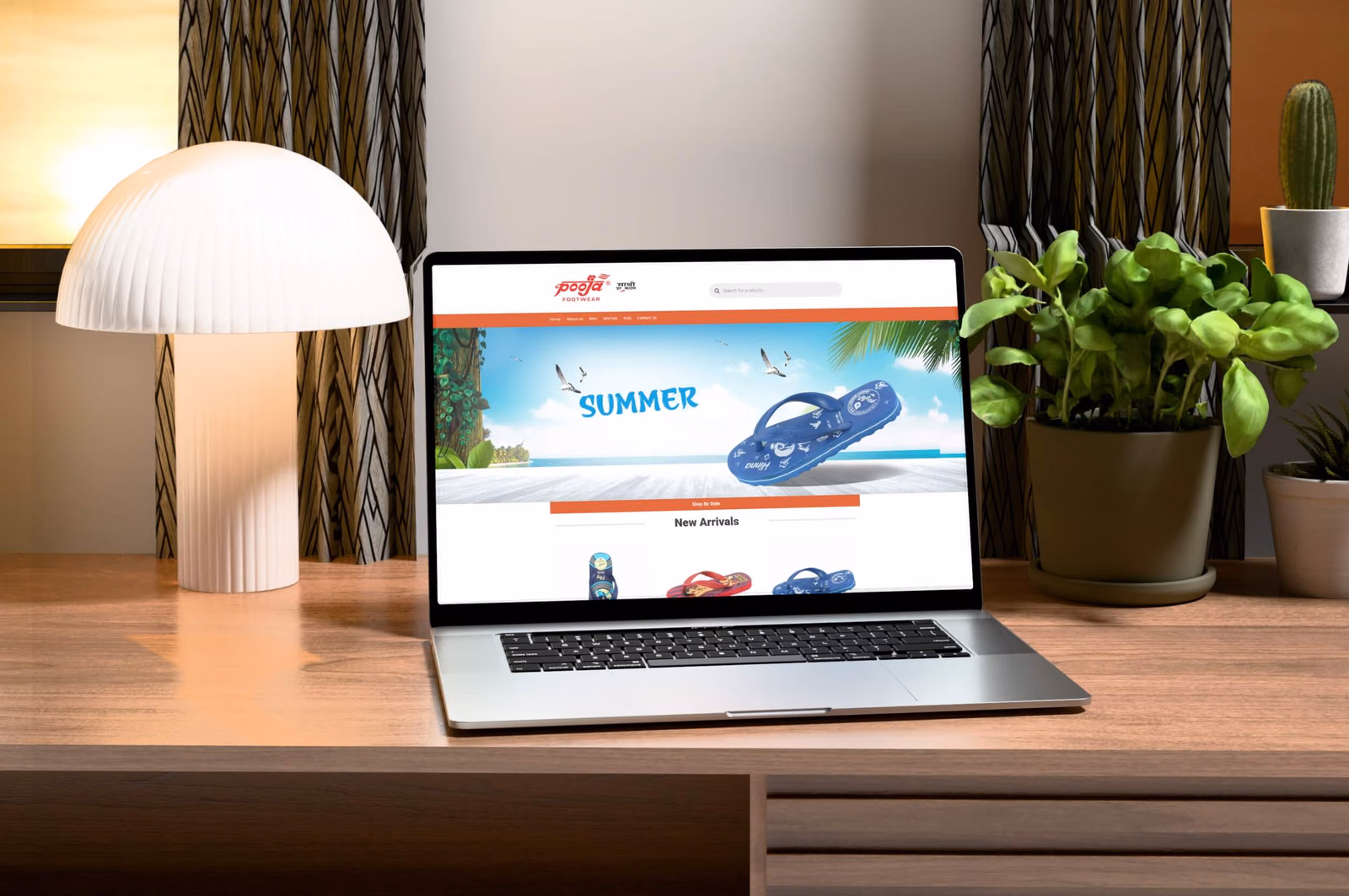 Pooja Footwear website on a laptop